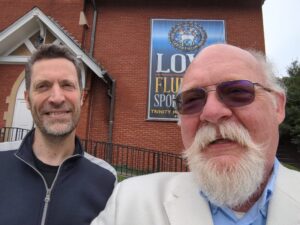 La Croix reporter Gilles Biassette visits with Trinity Moravian Church pastor, the Rev. John Jackman in WInston-Salem, NC.